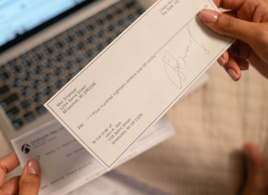 A cheque for an assignment fee